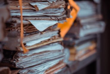 Stacks of archived papers and public records